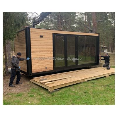 Kleines Holz-Metalllager für den Außenbereich mit modernem, erweiterbaren Behälter