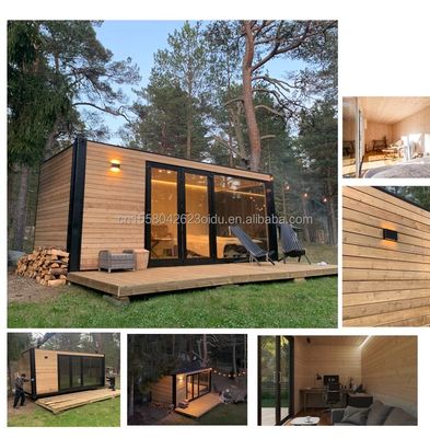 Kleines Holz-Metalllager für den Außenbereich mit modernem, erweiterbaren Behälter