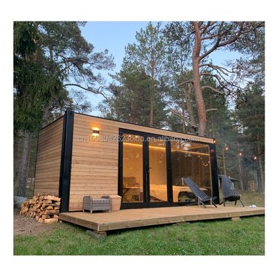 Kleines Holz-Metalllager für den Außenbereich mit modernem, erweiterbaren Behälter