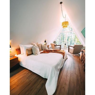 Stahlkonstruktion Dreieckhaus aus Holz